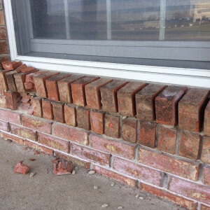 Cracked Brick on Window Frame